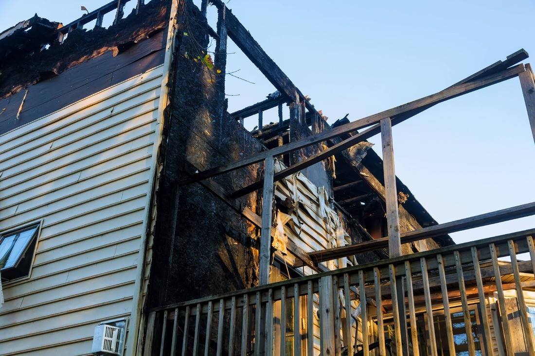 A Photo of smoke damage cleanup https://images.vc/image/4js/burned-home-after-fire-the-parts-of-the-house-afte-2022-11-12-11-21-04-utc.jpg