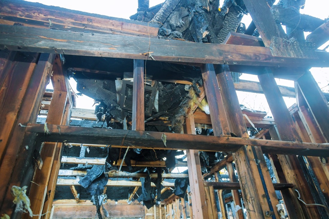 A Photo of Residential Fire Damage Restoration https://images.vc/image/4ot/interior-of-a-home-damaged-wall-after-a-fire-in-a-2022-11-12-11-13-02-utc_(2).jpg