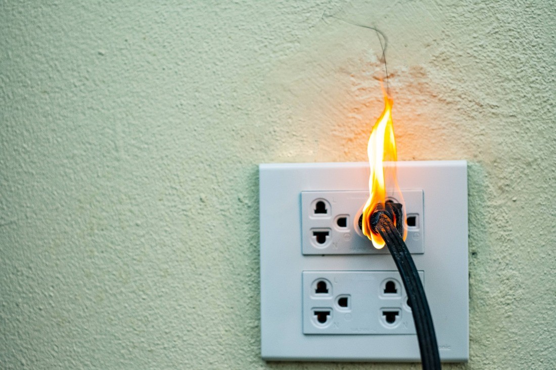 A Photo of Smoke Odor Removal https://images.vc/image/9wn/on-fire-electric-wire-plug-receptacle-and-adapter-2023-04-18-16-40-14-utc.jpg