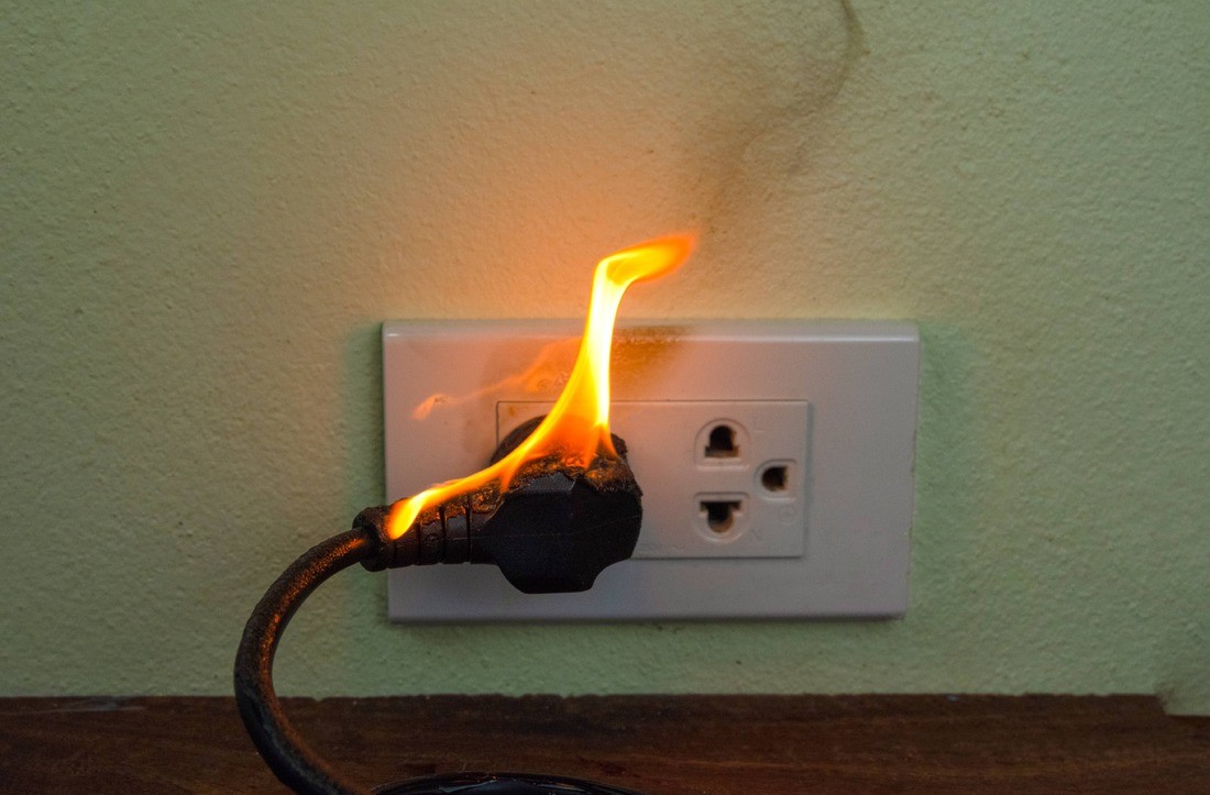 A Photo of Smoke Damage Cleanup https://images.vc/image/9wr/on-fire-electric-wire-plug-receptacle-wall-partiti-2023-04-11-01-19-22-utc.jpg