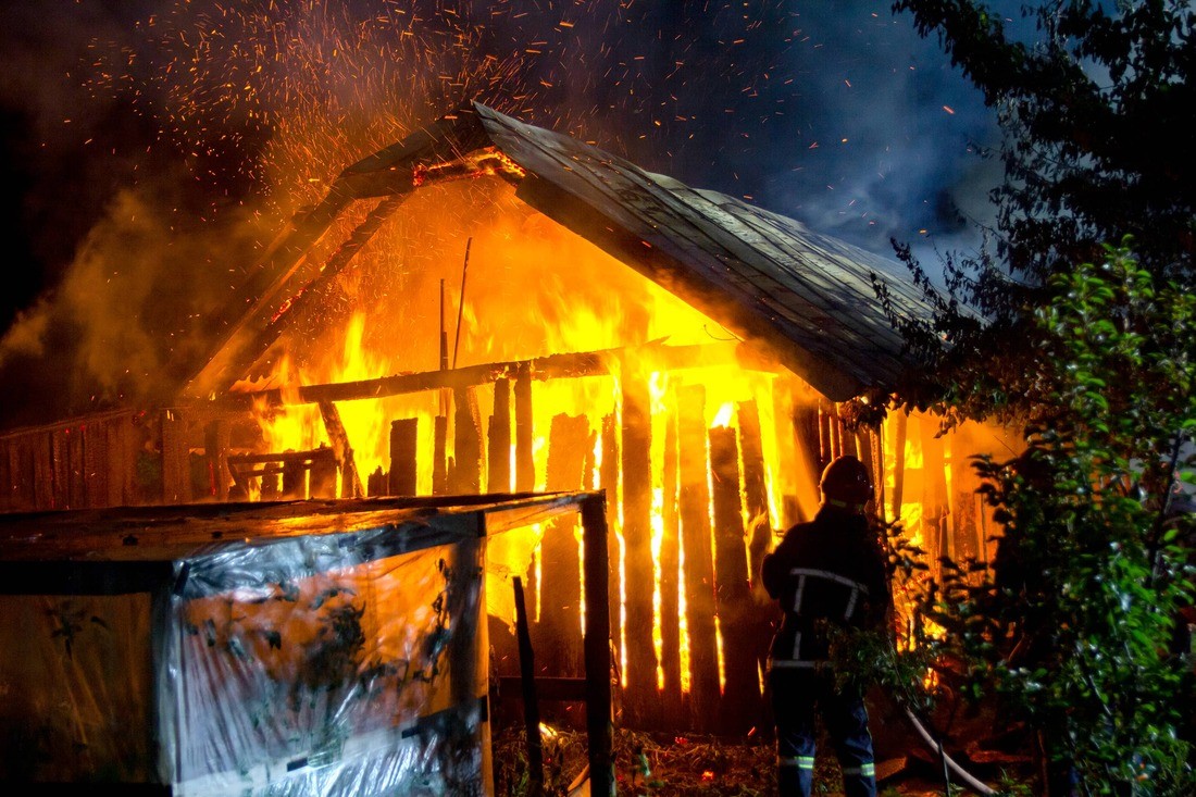 Picture related to commercial fire restoration https://images.vc/image/9wy/wooden-house-or-barn-burning-on-fire-at-night-2022-03-08-05-39-52-utc.jpg