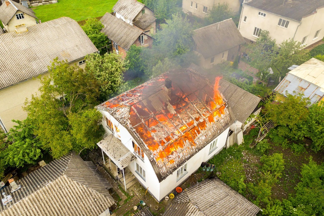 A Photo of Smoke Damage Restoration Company https://images.vc/image/9wz/aerial-view-of-a-house-on-fire-with-orange-flames-2022-01-04-19-57-35-utc.jpg