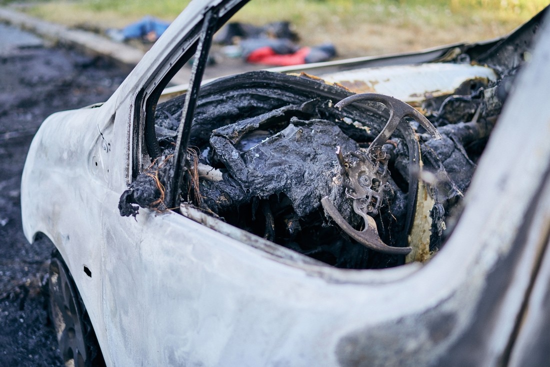 A Photo of fire damage restoration services https://images.vc/image/cbN/problem-on-road-car-after-accident-with-fire-clo-2022-11-15-23-06-00-utc_(2).jpg